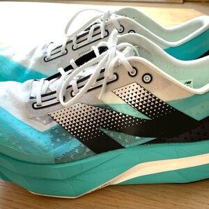 SOLD New Balance Men’s Teal and White Athletic Shoes